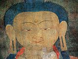 Lo Manthang Thubchen 04-4 Entrance Right Of Door Painting Of Buddha Close Up Buddha�s eyes gaze down in me to the right of the assembly hall entrance door at Thubchen Gompa in Lo Manthang.